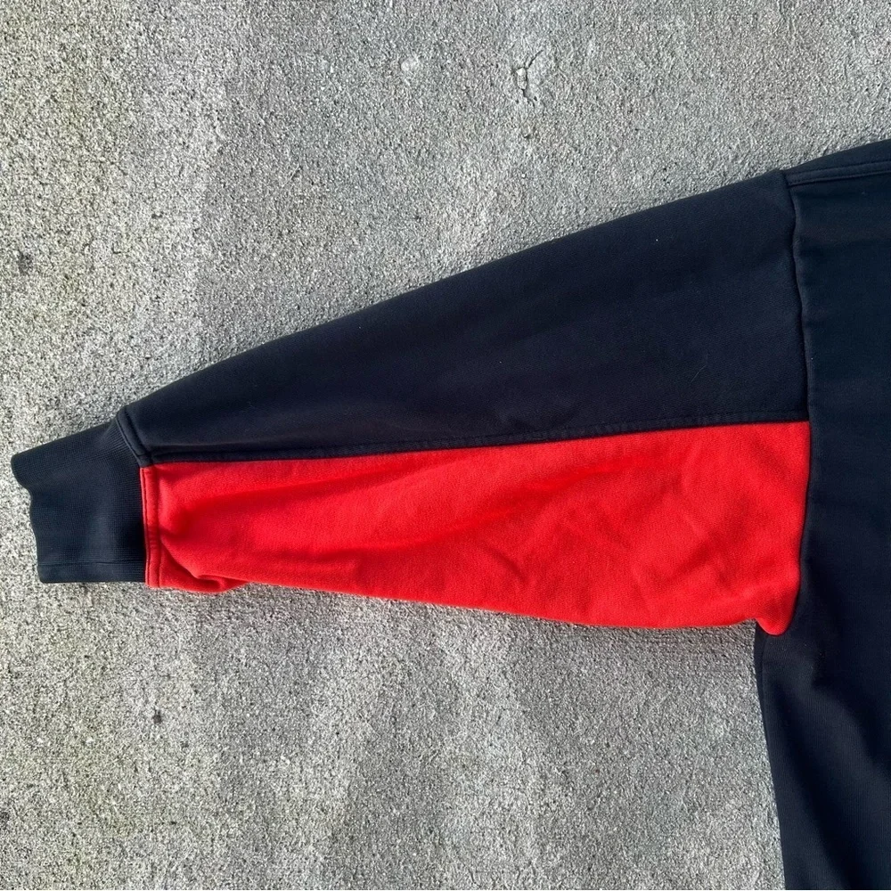 Nike Men's Black Sweater with Red and Blue Accents